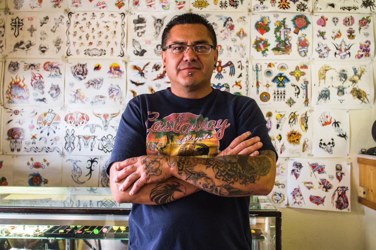 Mo in his Tattoo shop in TorC, New Mexico